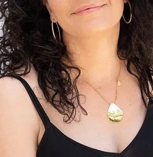 Gold platter statement necklace